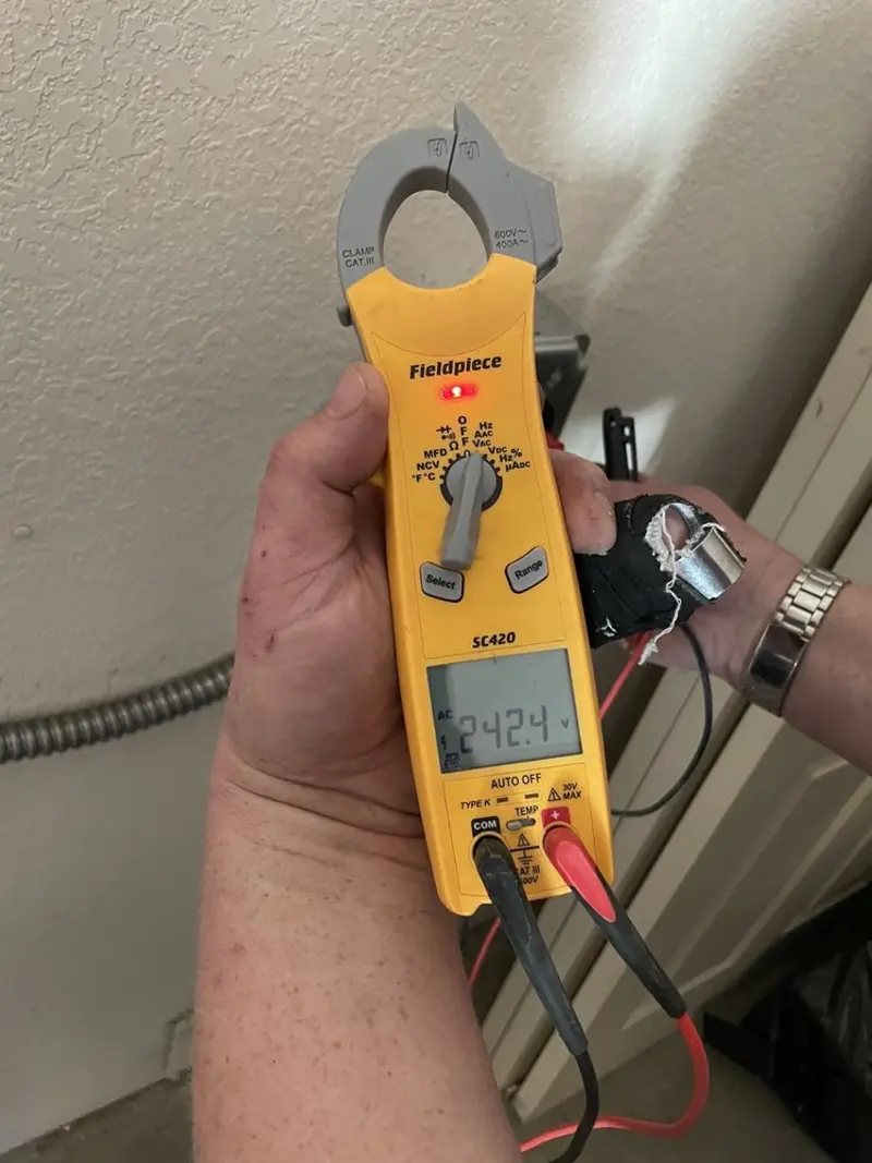 Voltage testing with clamp meter during Aluminum Wiring Replacement in Belle Chasse